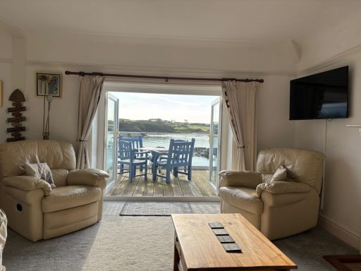 Double glass doors open onto the balcony